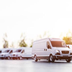 istockphoto-1422531282-612x612 Transportation van and fleet of cargo trucks courier service. Transport, shipping industry. 3D illustration